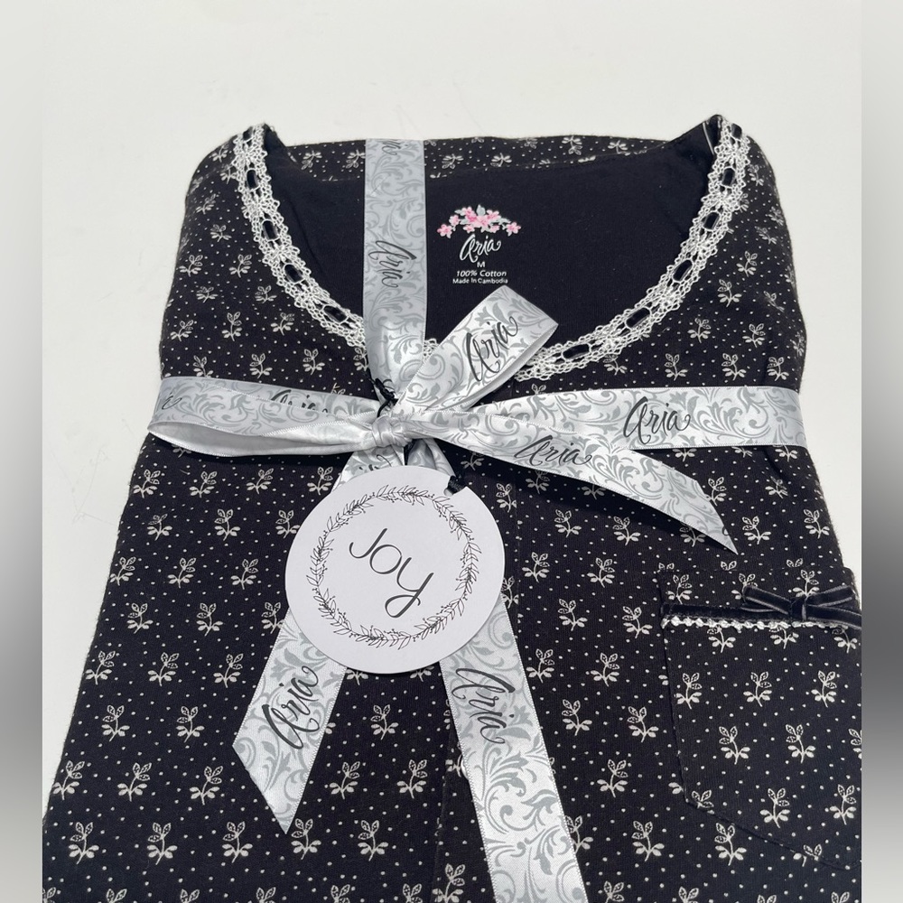 Brand New. Ladie’s 2 piece long sleeve and pants pajama set.